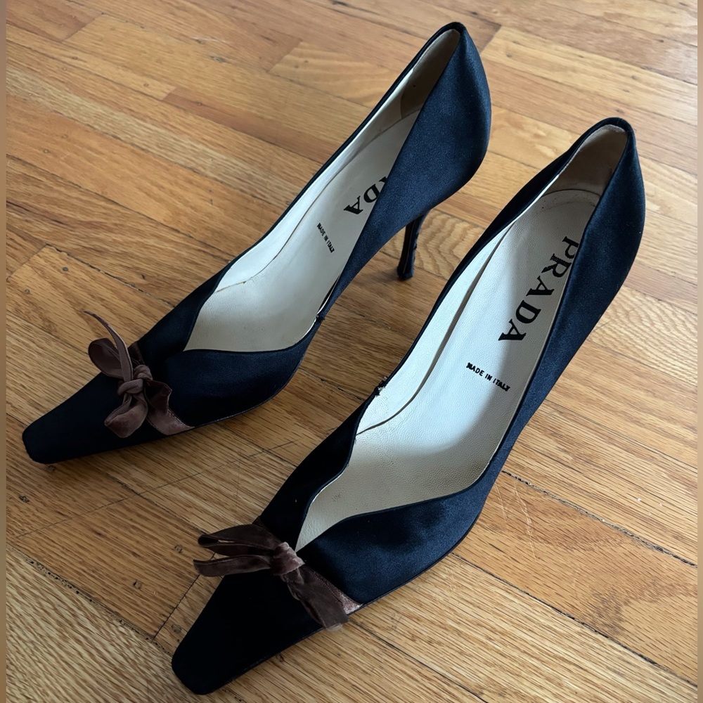 Black Prada Pointed Heels with Brown Ribbons